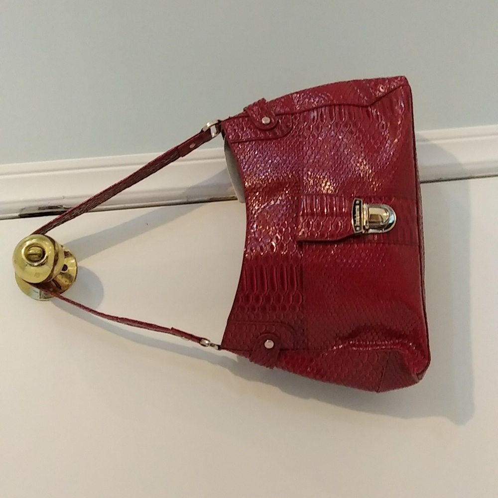 Purse, 7 inches deep, 5 inches wide. Red.